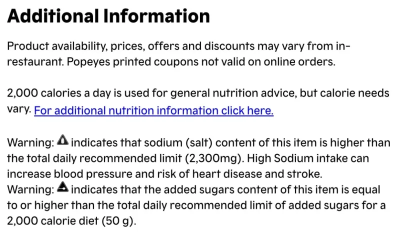 A screenshot of the Popeye's website explaining the additional nutrition information, including warning icons that indicate high added sugar and sodium content, which is available for menu items for locations in New York City.