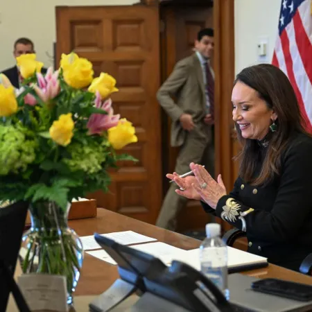 Department of Agriculture Secretary Brooke Rollins sitting at her desk