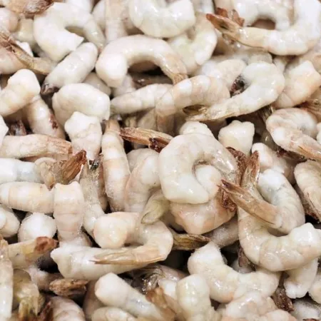 A closeup shot of frozen raw shrimp