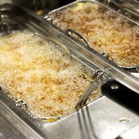 fryer with bubbling oil inside