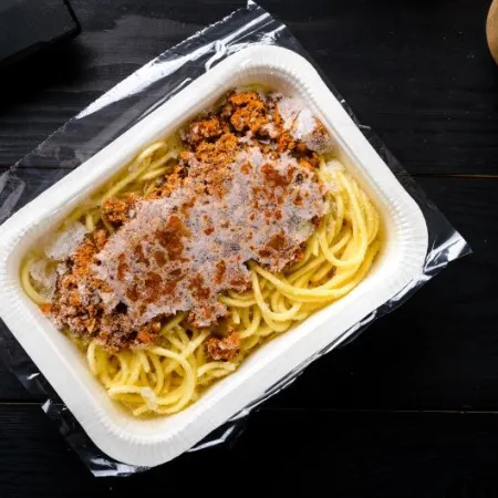 frozen spaghetti bolognese on a table