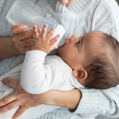 Baby drinking formula