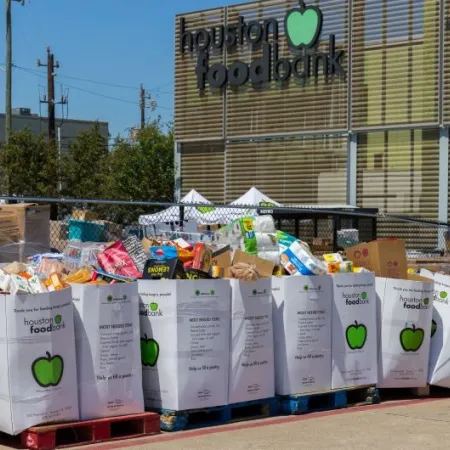 Local charity food bank preparing food kits during national emergency